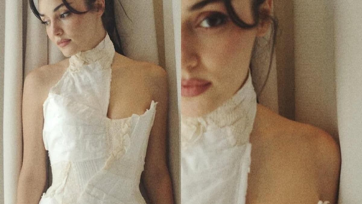 Hande Erçel beyaz elbisesiyle objektife poz veriyor